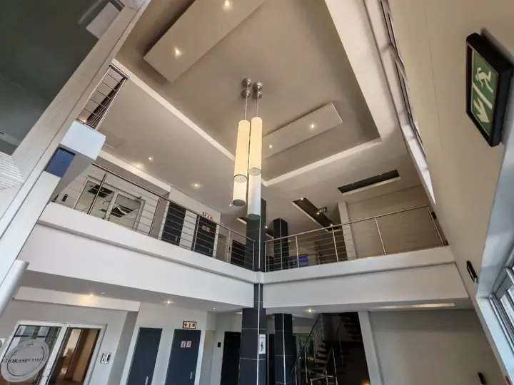 Atrium with pendant lights and gallery landing at Corporate Park 66